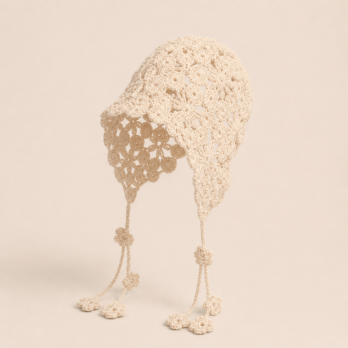 Hand-Crocheted Openwork Floral Tassel Bonnet